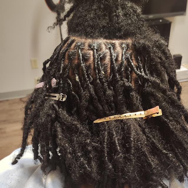 Dread maintenance retwist at Butterfly Beauty 24hour Braid lounge in York, PA